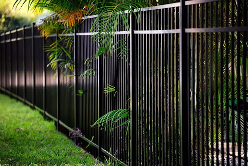 Black aluminum fence in the backyard.